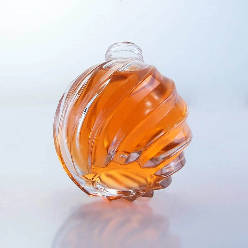 four parts mold 200ml carving glass bottle embossing ball shape perfume glass bottle 