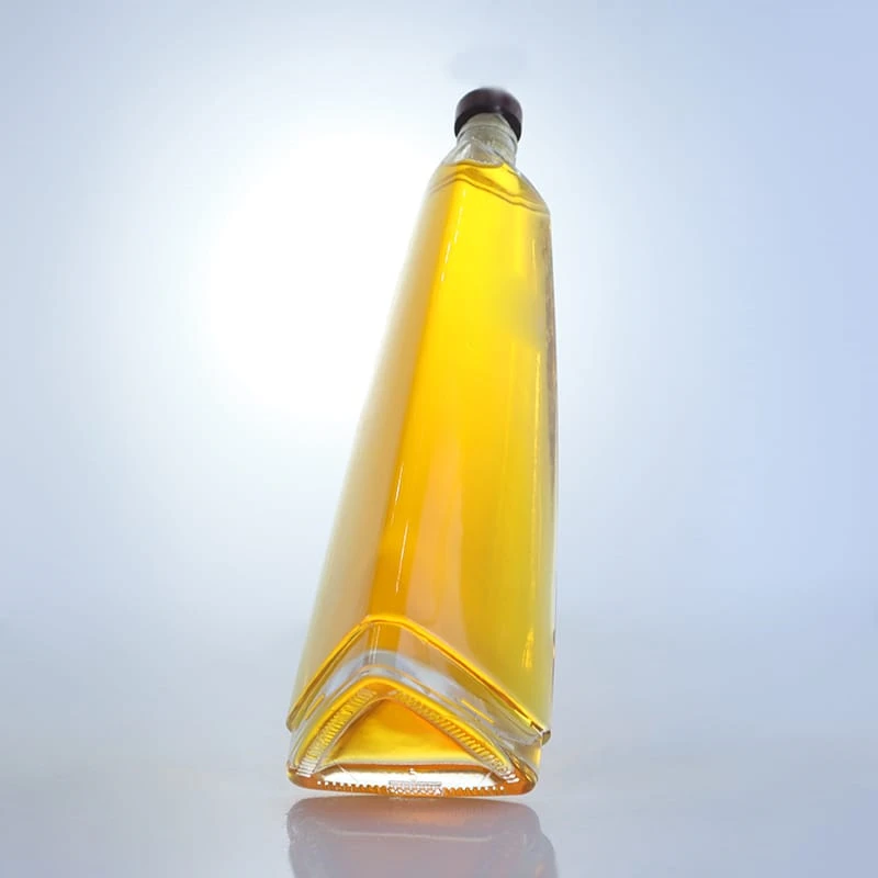 157-Unique triangle-shaped glass bottle with embossed logo