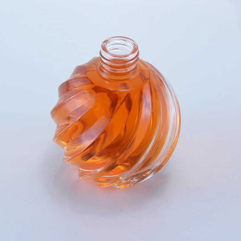four parts mold 200ml carving glass bottle embossing ball shape perfume glass bottle 