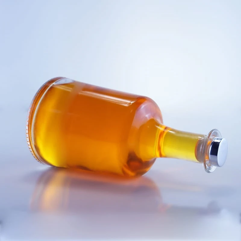 097-custom shape wide bottom long neck transparent glass bottle