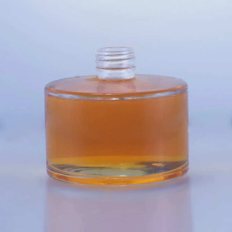 103-new design short round glass bottle with screw cap
