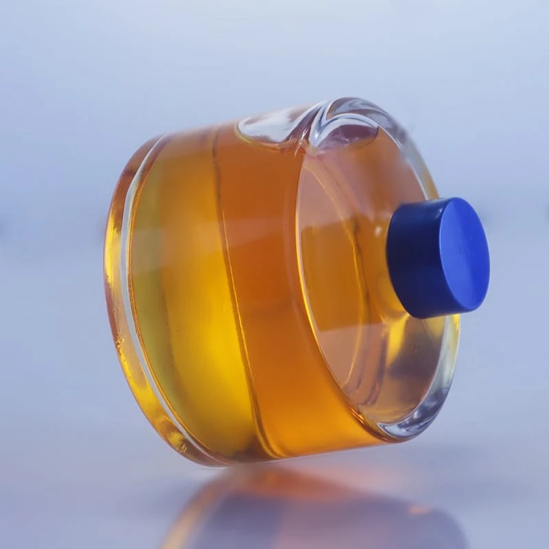 103-new design short round glass bottle with screw cap