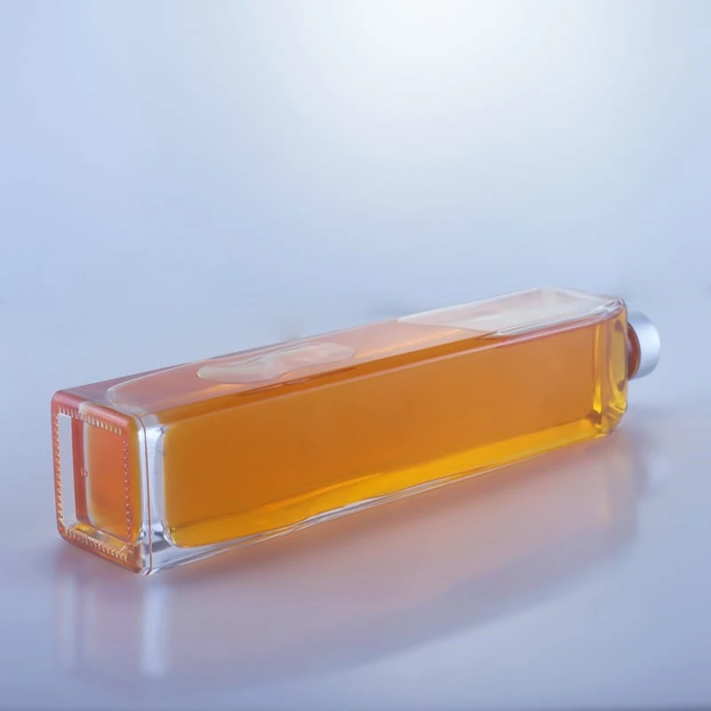 109-700ml thin and tall square brandy bottle with screw cap