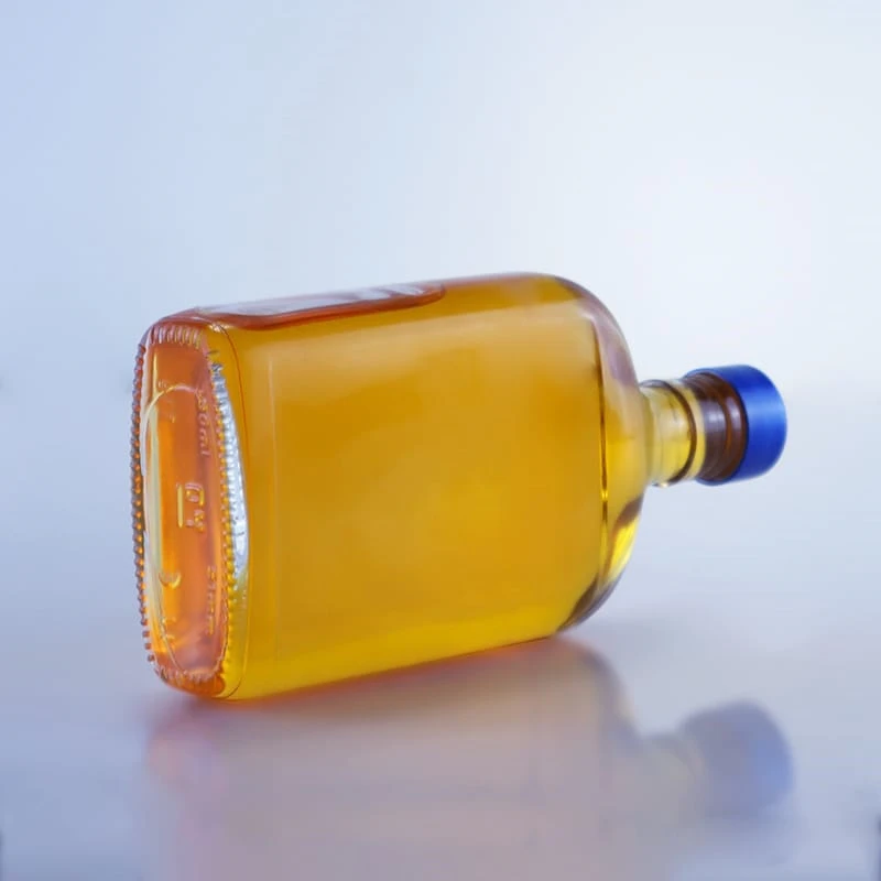 117-flat shape embossed bottom high flint glass bottle