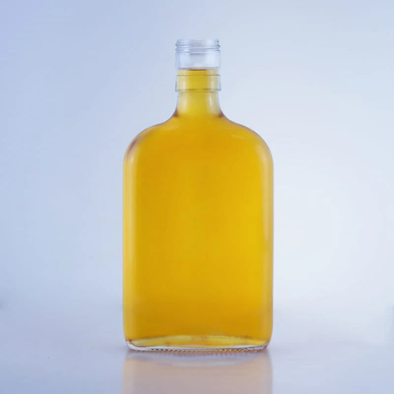 117-flat shape embossed bottom high flint glass bottle