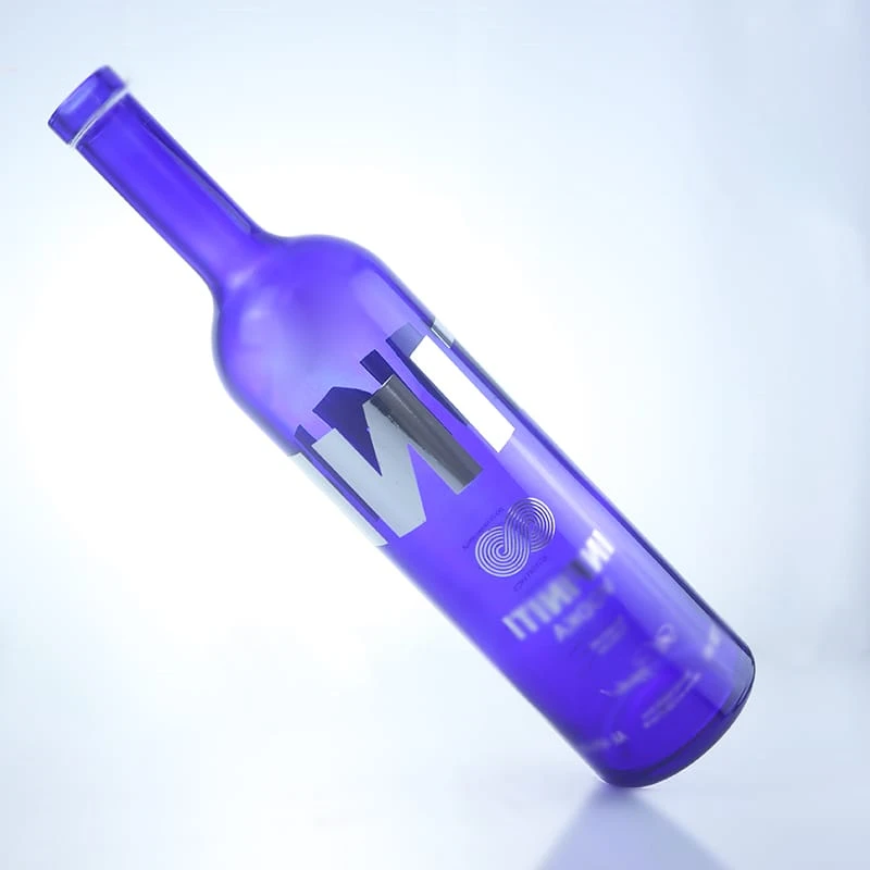 blue colored 750ml vodka bottle with silver shinning decal