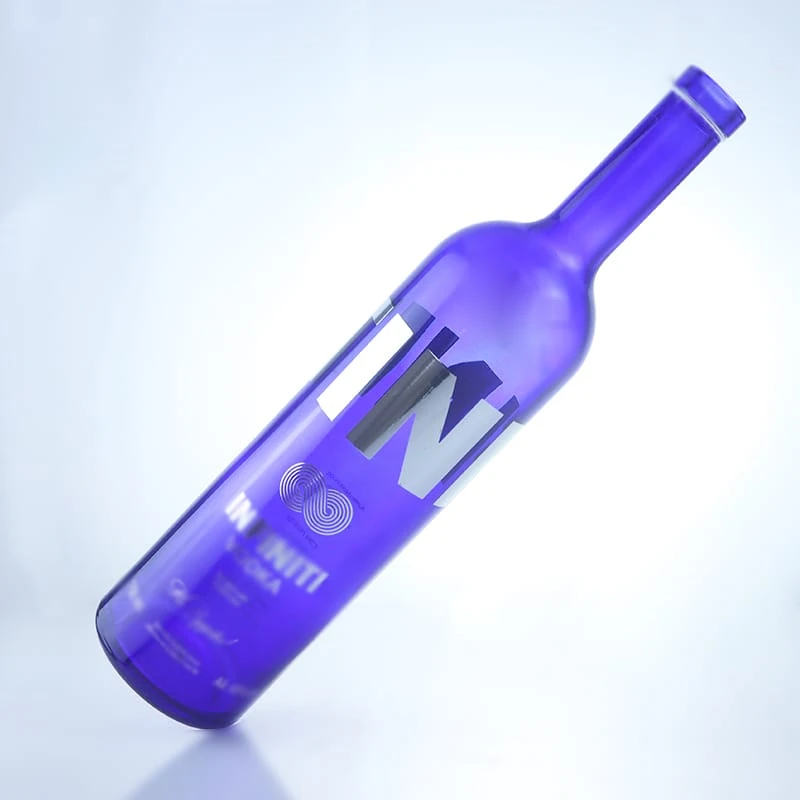 blue colored 750ml vodka bottle with silver shinning decal