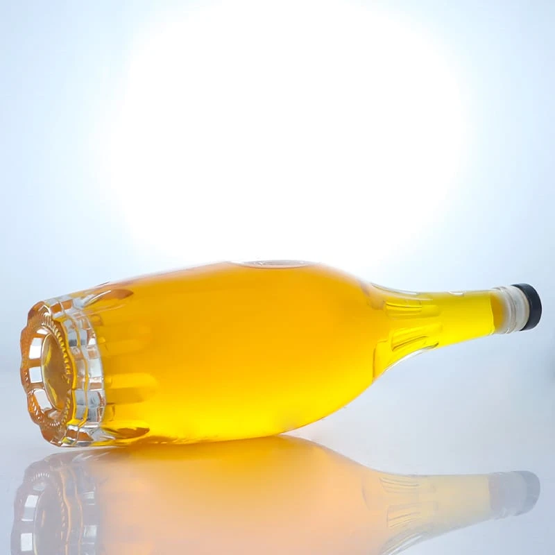 222-Ribbed and tapered glass bottle for spirits