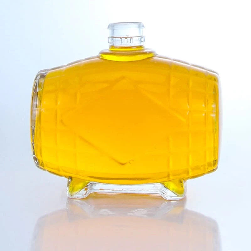 354-Unique shaped glass spirits bottle with guala cap