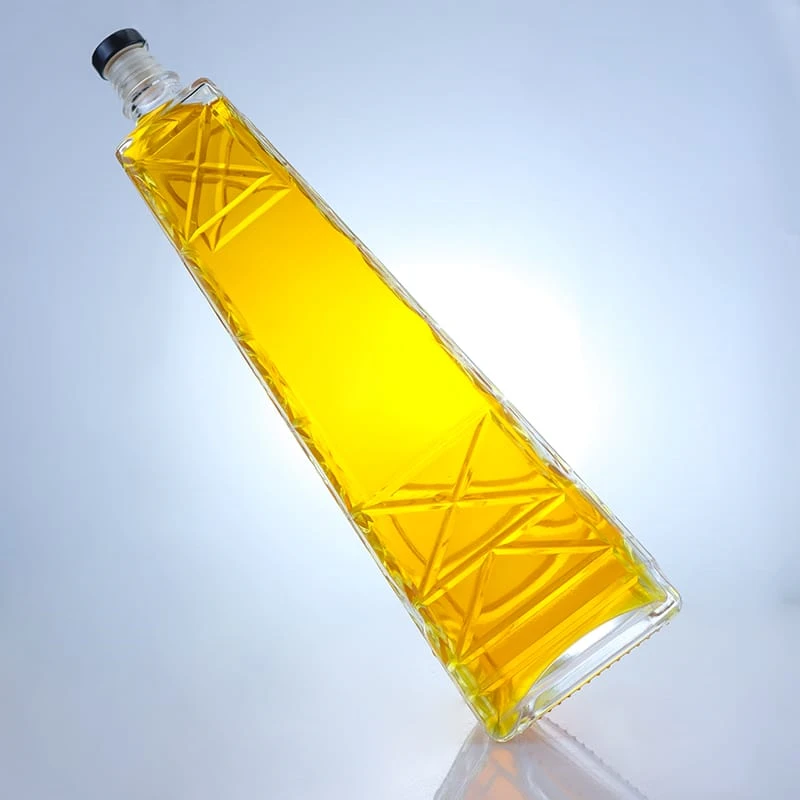 232-Customized tapered and ribbed empty glass vodka bottles