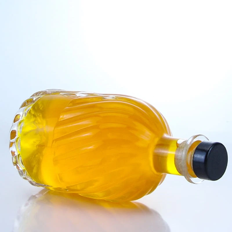 new design carving round drop bottom 200ml glass bottle