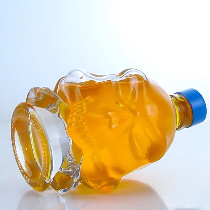 410-500ml unique design clear heavy glass bottle with screw cap