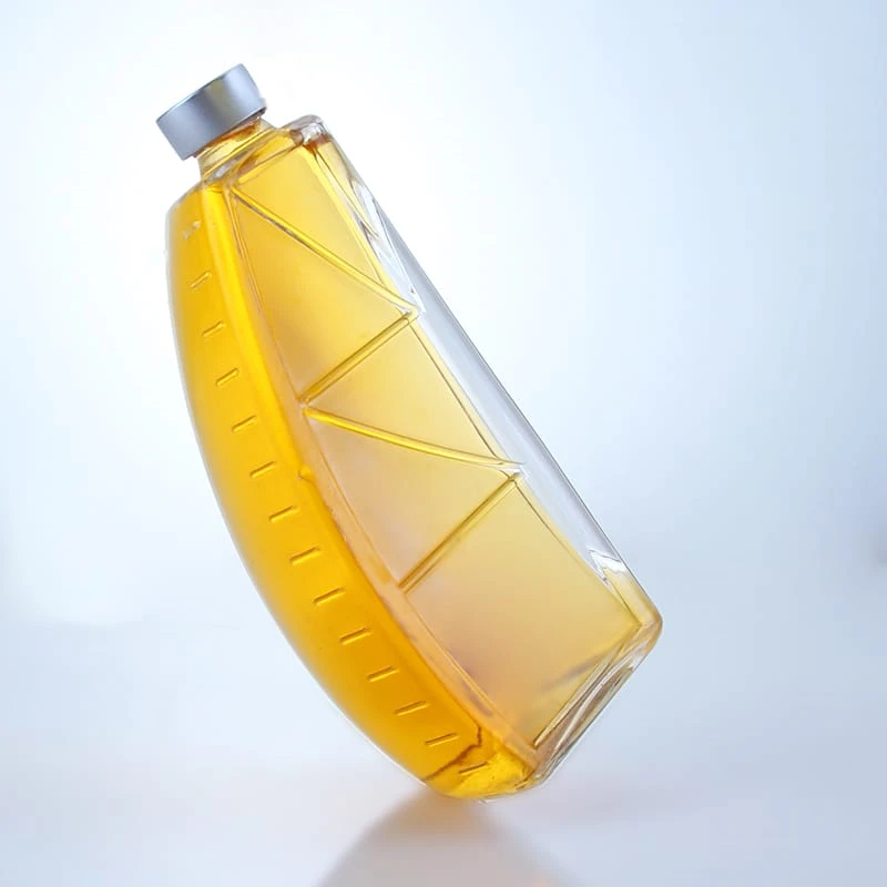 Custom sailboat shaped glass liquor bottle with guala cap