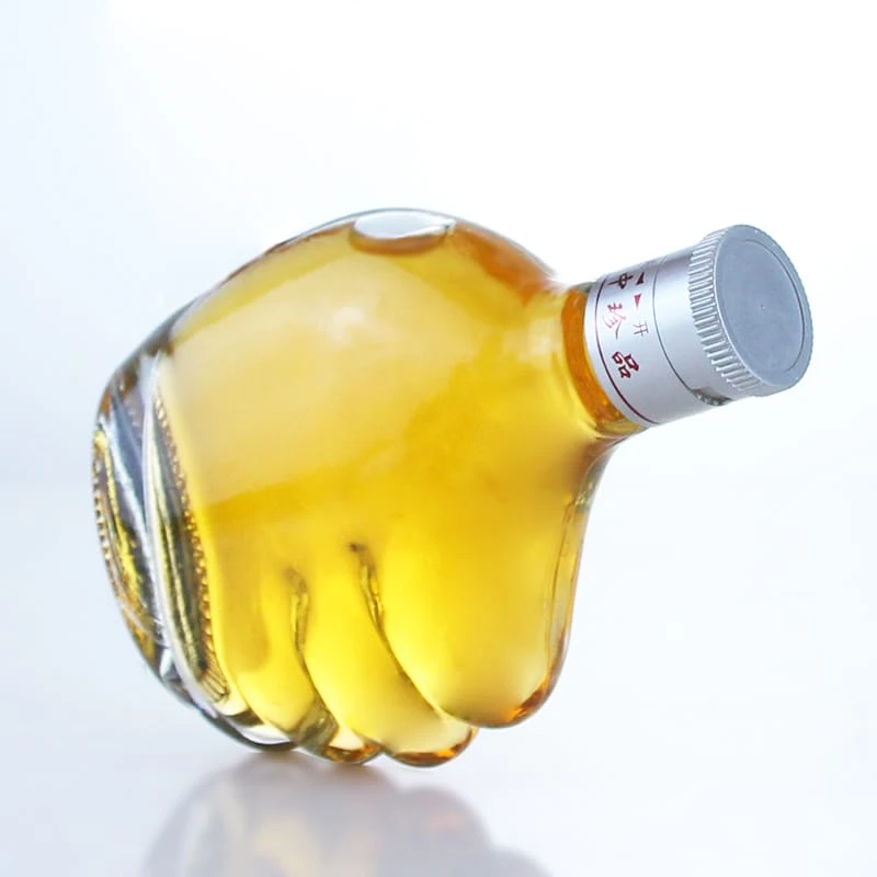 430-Fist Shaped clear Glass spirits bottle with ropp cap