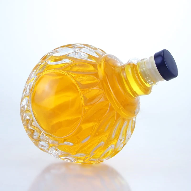 197- 200ml embossed mini round glass bottle with guala cap