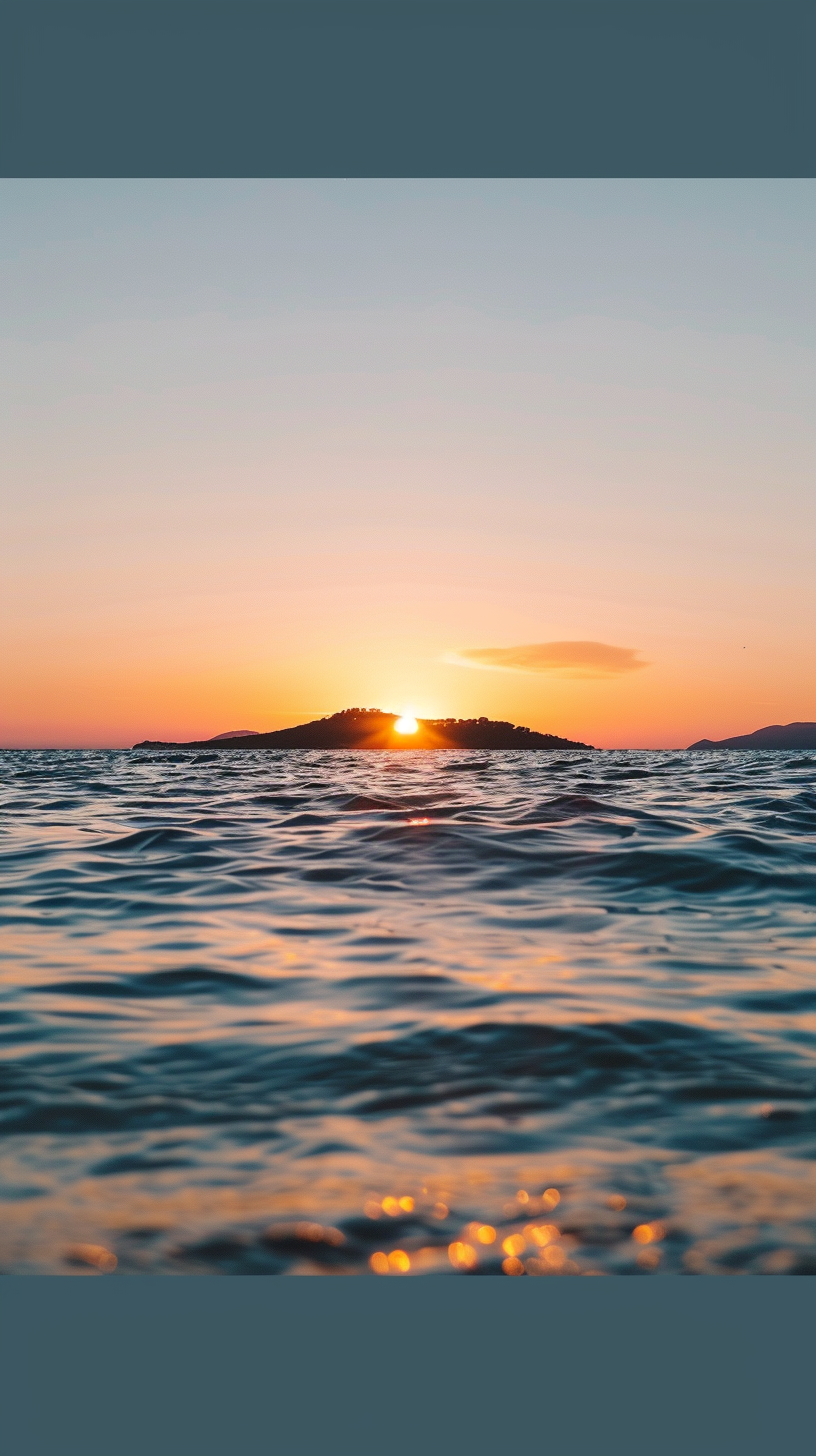 The setting sun slanted, orange and blue interwoven against the sea, and the island was quiet and bright.